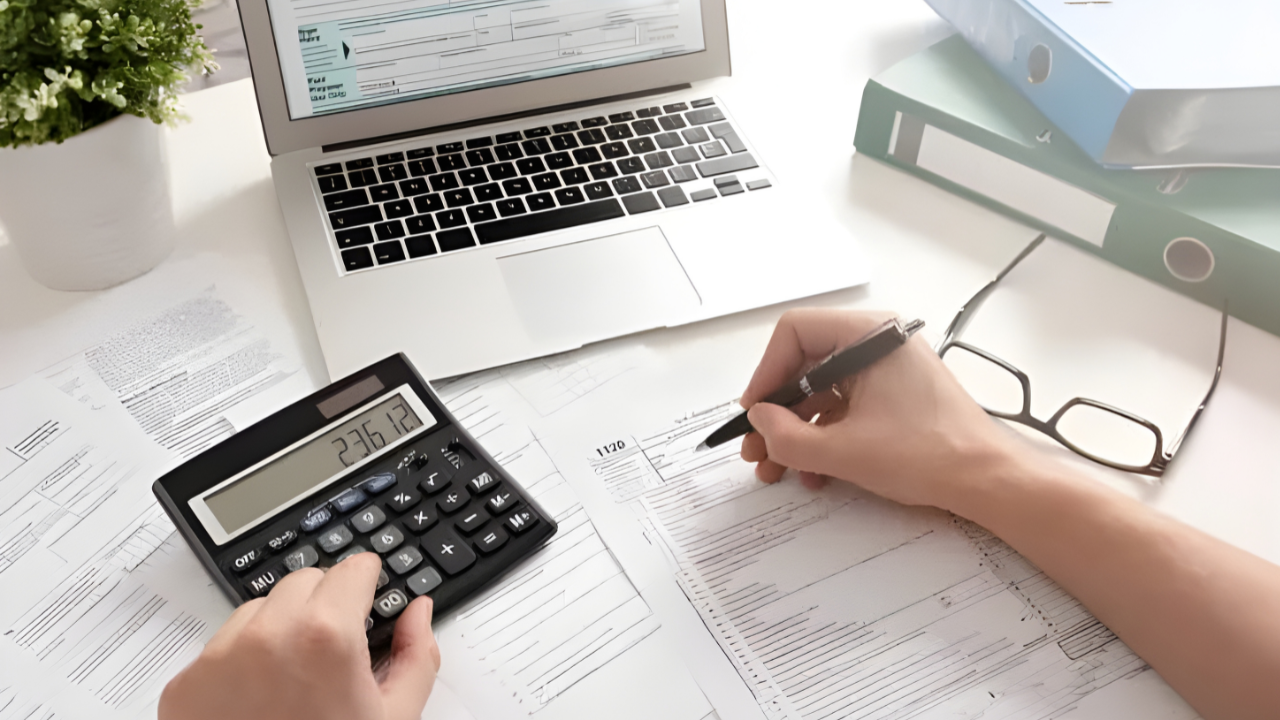 IRS tax documents and calculator on desk representing audit concerns