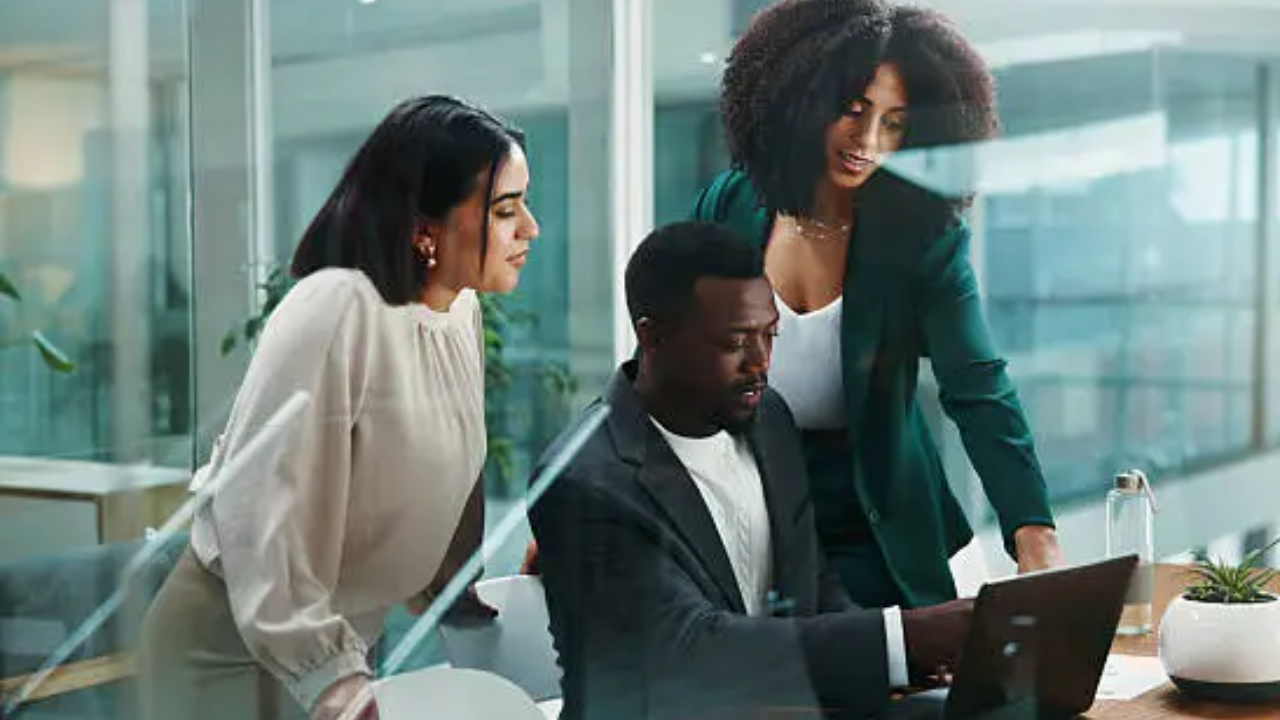 Professional tax team working together on client case